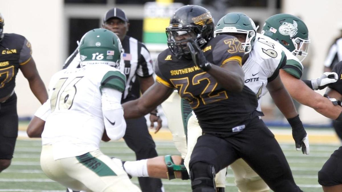 Southern Miss defensive end Xavier Thigpen sacks Charlotte quarterback Hasaan Kluge in Hattiesburg on Nov. 5.