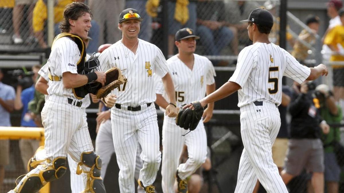 Cole Donaldson, Cooper Jones and Nick Sandlin celebrate after surviving their opening game against UIC at the Hattiesburg Regional Tournament, Friday, June 2, 2017.