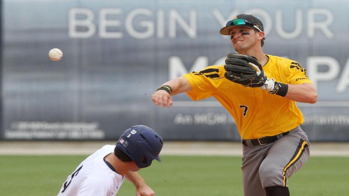 Southern Miss second baseman Matthew Guidry throws to first after putting Rice's Charlie Warren during the third inning of their C-USA tournament championship game at MGM Park in Biloxi on Sunday.
