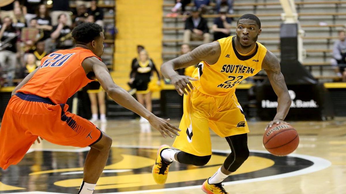 Southern Miss' Quinton Campbell dribbles the ball while guarded by UTEP's Earvin Morris on Jan. 28, 2016, in Hattiesburg.