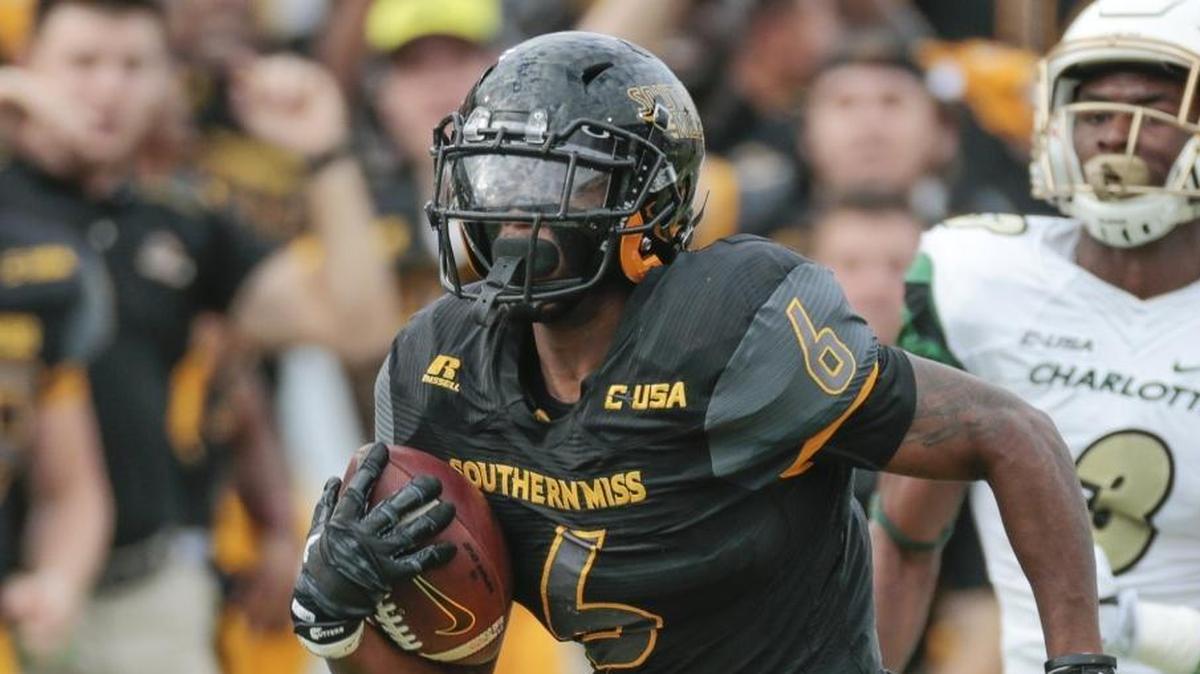 Southern Miss defensive back Kelsey Douglas returns an interception for a touchdown against Charlotte in Hattiesburg on Nov. 18.