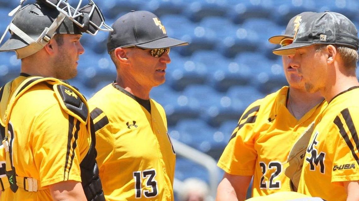 Southern Miss pitching coach Michael Federico talks to players during their C-USA tournament game against Louisiana Tech at MGM Park in Biloxi on May 25.