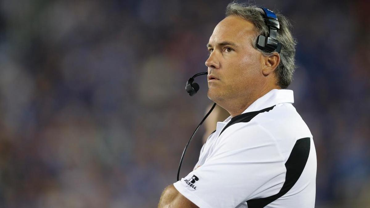 Southern Miss head coach Jay Hopson watches the clock in the second half of an NCAA college football game against Kentucky Saturday in Lexington, Ky. Southern Miss won the game 44-35.