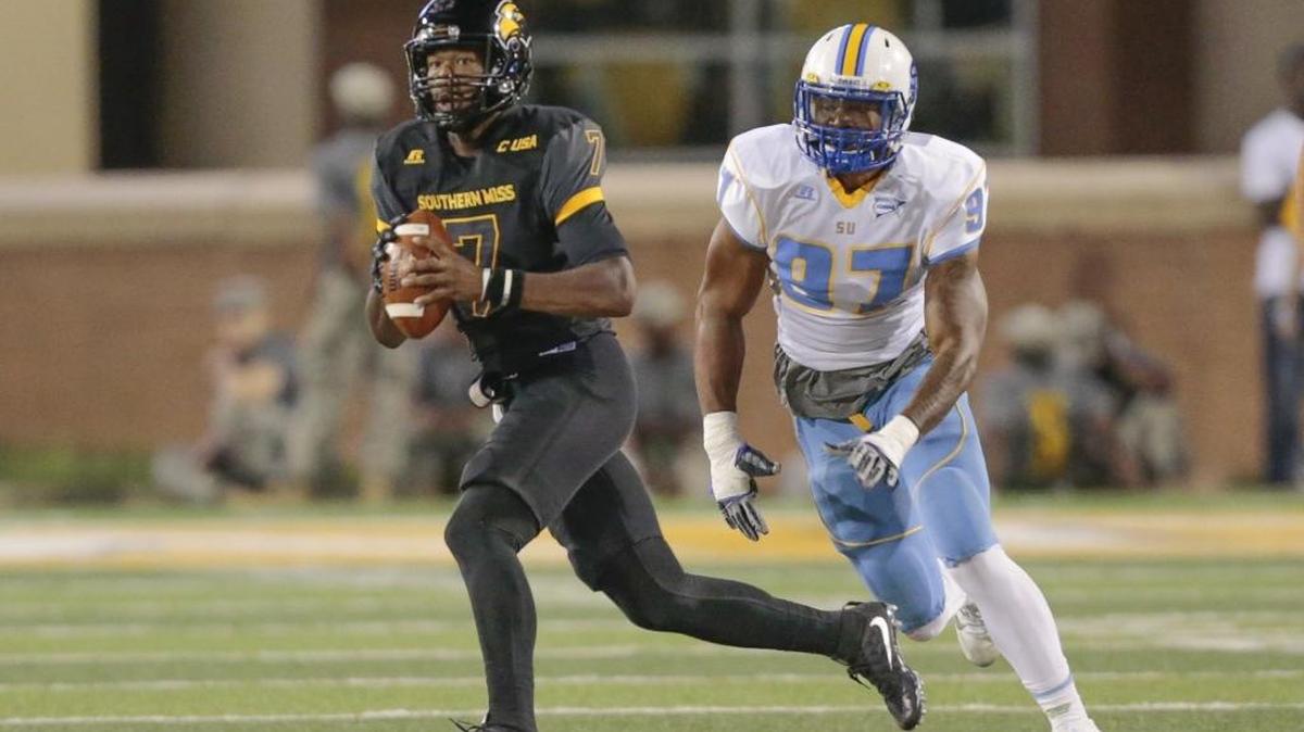 Southern Miss Golden Eagles quarterback Kwadra Griggs (7) looks for open receivers during the game between Southern Miss and Southern University at M.M. Roberts Stadium on Saturday.