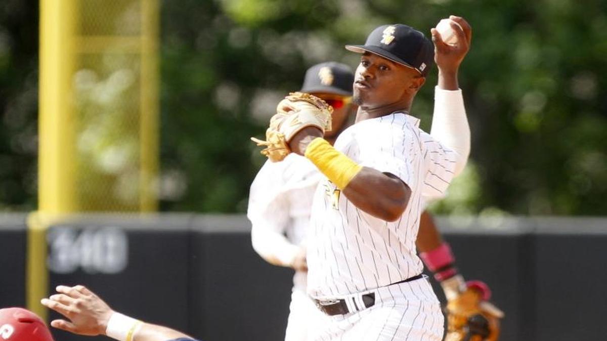 Southern Miss second baseman Tracy Hadley fires to turn a double play as UIC's Ricardo Ramirez slides into second at the Hattiesburg Regional on June 2.