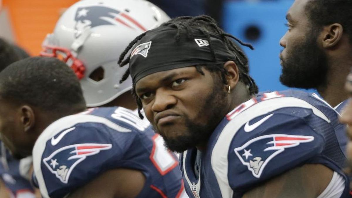 New England Patriots linebacker Jamie Collins sits on the bench during the second half of an NFL football game against the Buffalo Bills on Oct. 2, 2016, in Foxborough, Mass.