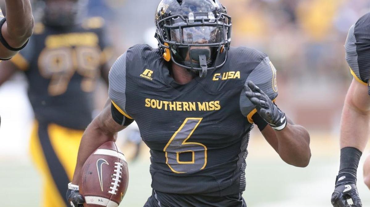 Southern Miss defensive back Kelsey Douglas runs an interception back for a touchdown during the first quarter of the game against Charlotte at Roberts Stadium in Hattiesburg Saturday.