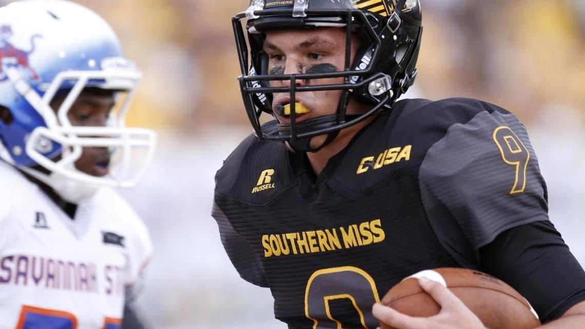 Southern Miss quarterback Nick Mullens scores the first Golden Eagle touchdown against Savannah State earlier this season in Hattiesburg.