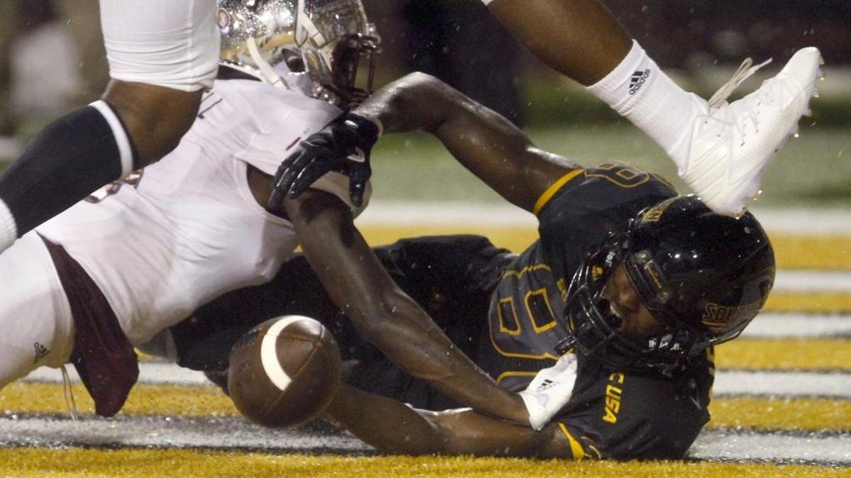 Southern Miss receivers struggled catching the ball in the first half with a steady rain falling. Isiah Jones dropped this pass in the end zone in Hattiesburg.