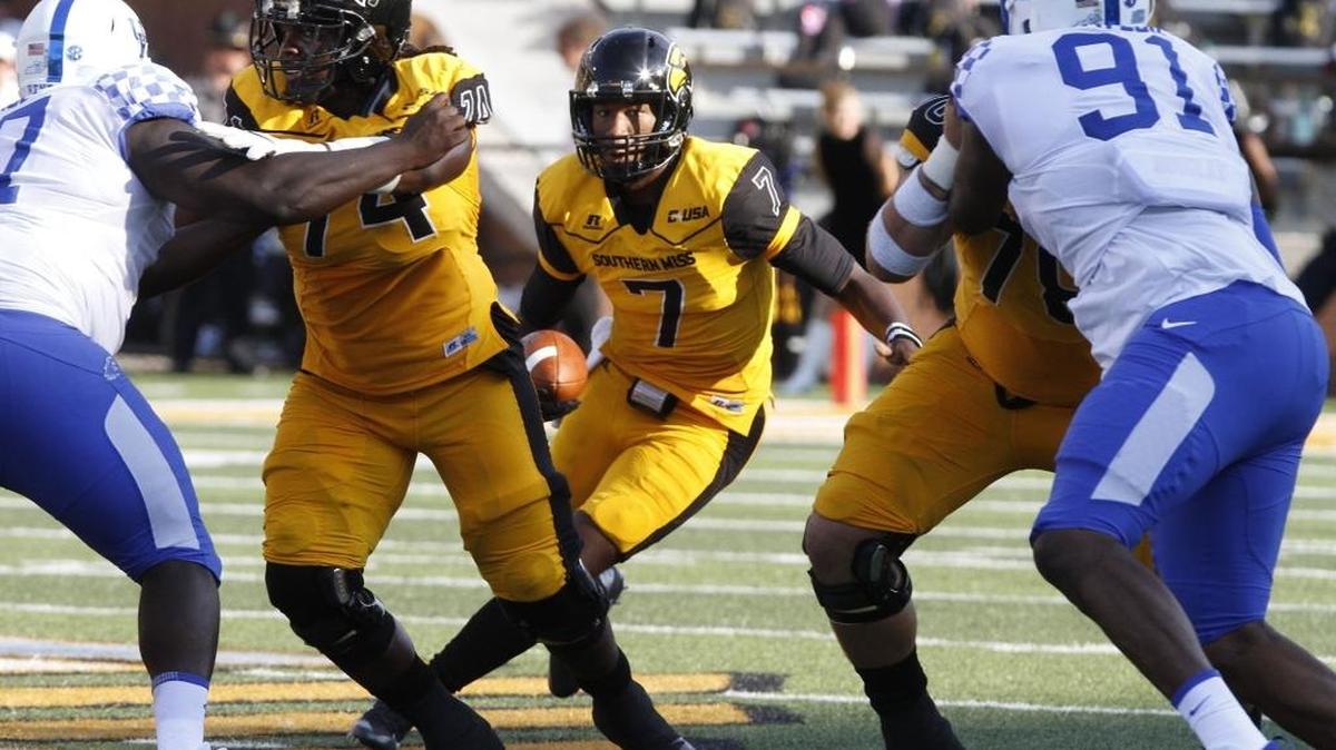 Southern Miss quarterback Kwandra Grigg looks for room to scramble against Kentucky during the third quarter of their game at M.M. Roberts Stadium in Hattiesburg on Sept. 2.