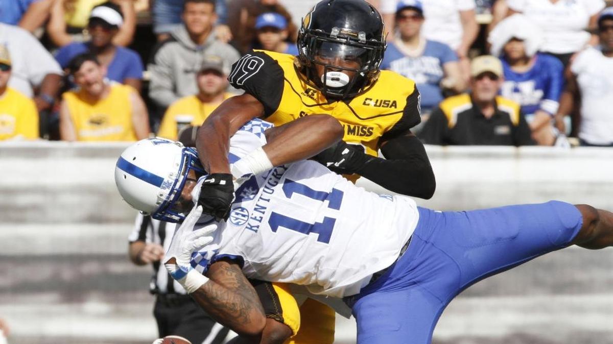 Southern Miss defensive back Curtis Mikell breaks up a pass intended for Kentucky wide receiver Tavin Richardson during the second quarter of their game at M.M. Roberts Stadium in Hattiesburg on Sept. 2, 2017.