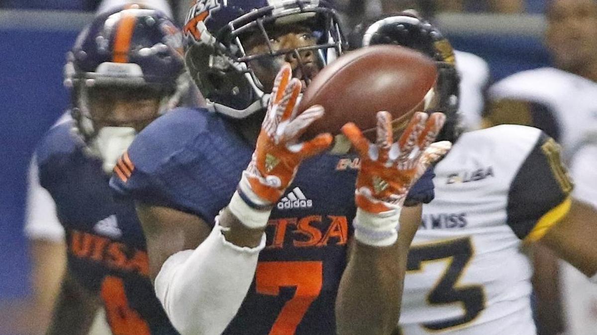 UTSA's Kerry Thomas Jr. hauls in a 71-yard touchdown reception during against Southern Miss at the Alamodome Saturday in San Antonio, Texas.