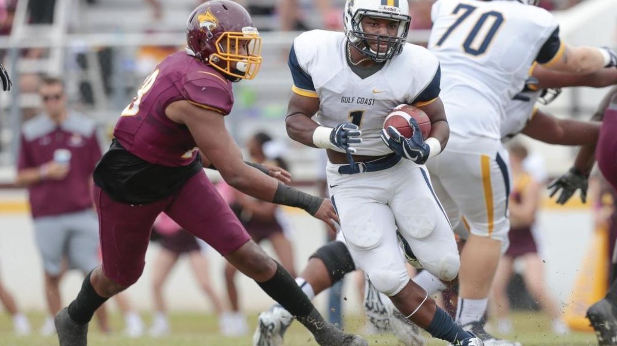 Mississippi Gulf Coast Community College running back and former Gautier star Deandre Torrey, right, has recently seen his recruiting interest pick up.