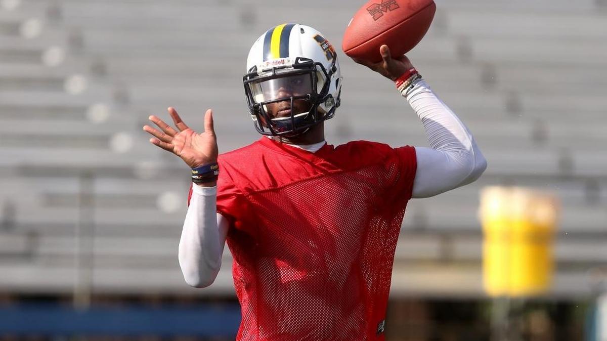 Mississippi Gulf Coast Community College quarterback Torrance Gibson runs a play during practice on Monday. Gibson was a previous Ohio State signee who was moved to receiver before attempting to transfer to Cincinnati. Instead, Gibson landed at MGCCC.