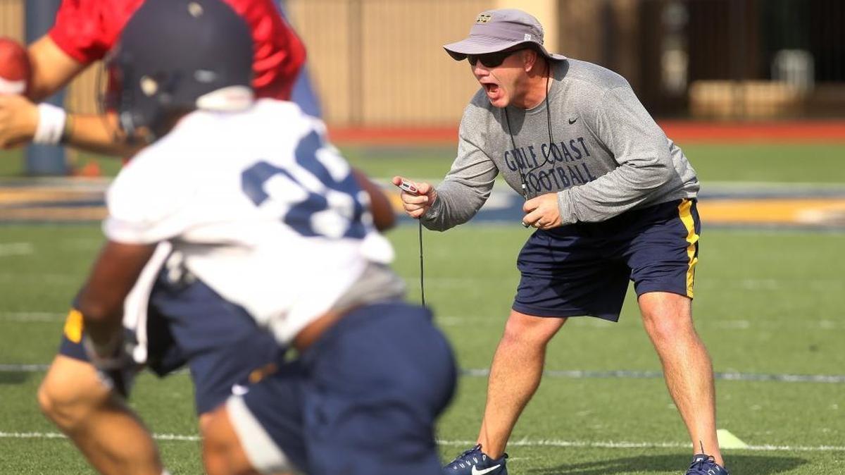 Mississippi Gulf Coast Community College football coach Chad Huff pushes his players during their first practice of the season on Monday, August 7, 2017. Huff has reportedly joined South Alabama’s staff as a tight ends coach.