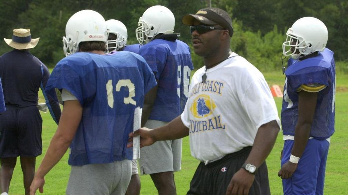 Stevon Moore assists with coaching the team during practice at Mississippi Gulf Coast Community College on the Perkinston campus Monday. According to a report, Moore has been hired by Alabama to serve as a defensive analyst.