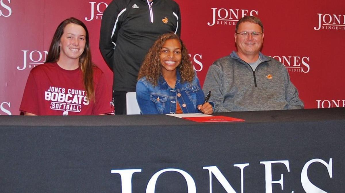 Jones County Junior College outfielder Simone McKinney signed a scholarship with Alcorn State University on Thursday in the McClellan Hall Media Room. Seated, from left, are JCJC assistant coach Katie White, Simone McKinney and JCJC head coach Chris Robinson. Standing is JCJC associate head coach Bob Herrington.