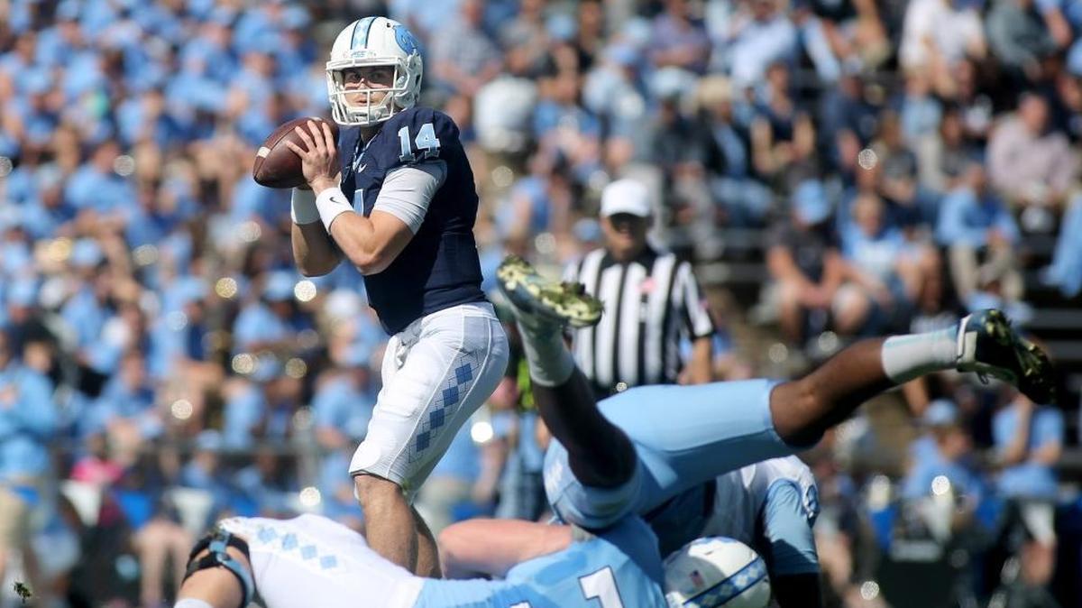 North Carolina quarterback Logan Byrd (14) looks to pass the ball as North Carolina guard Mason Veal (72) blocks North Carolina defensive end Allen Carter (33) during the spring game at Fetzer Field in Chapel Hill, N.C. on Saturday, April 8, 2017. Byrd tweeted on Friday that he’s transferring to Mississippi Gulf Coast Community College.