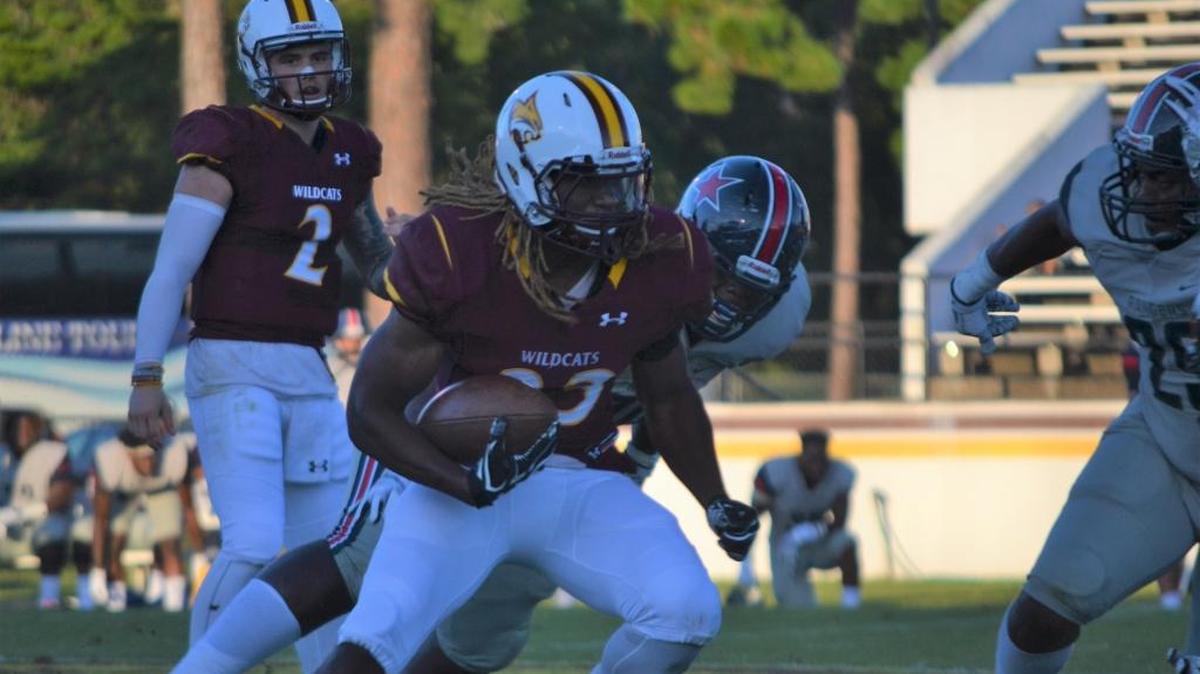 Pearl River running back Chandler Roberts makes a move after taking a handoff from quarterback Justin Agner during action Thursday at Poplarville.