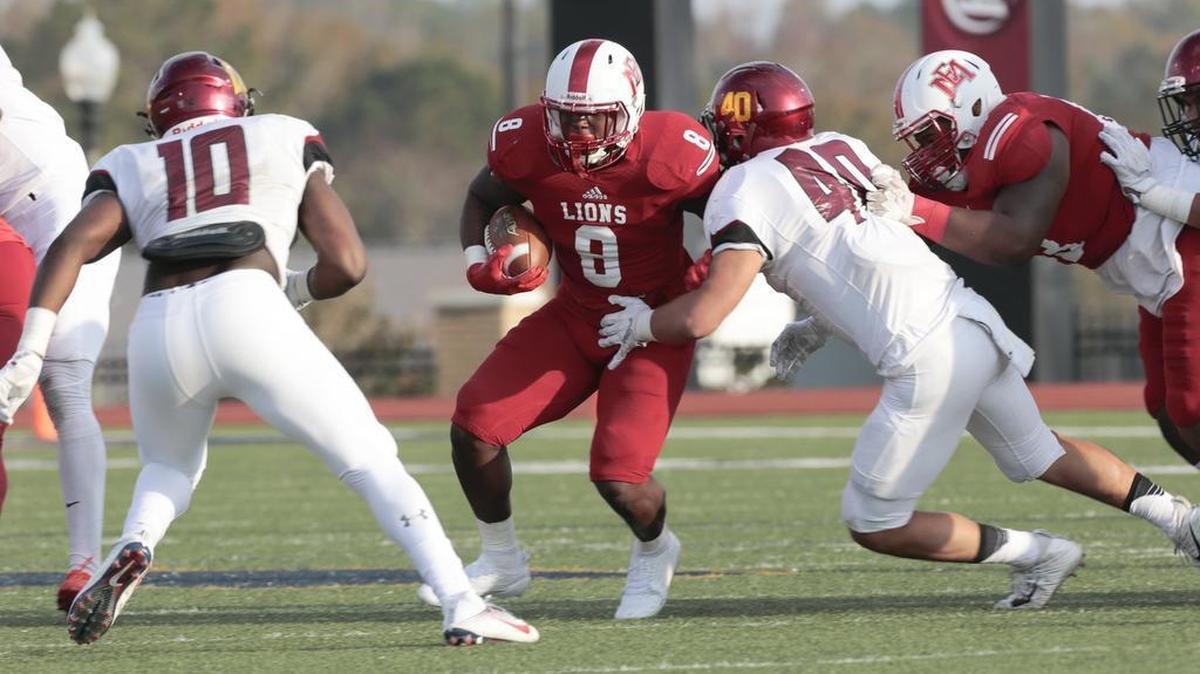 East Mississippi Community College Tyrell Price (8) is tackled by Arizona Western Community College linebacker Nathanael Heaukulani ( 40) during the Mississippi Bowl at A.L. May Memorial Stadium, Perkinston, Sunday, December 3, 2017.