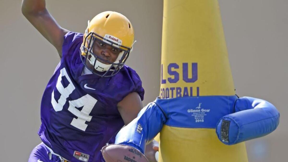 LSU outside linebacker Isaiah Washington (94) bears down on the target during LSU football practice on August 5, 2016. Washington tweeted Tuesday that he has transferred to Mississippi Gulf Coast Community College.