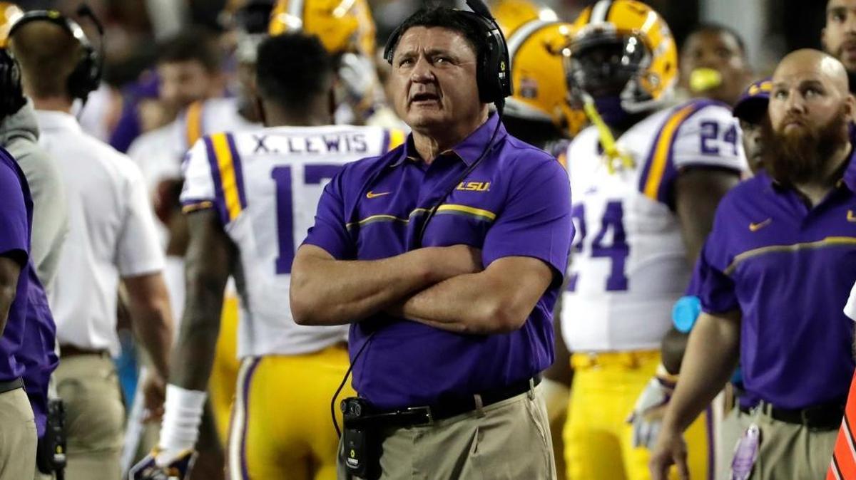 LSU coach Ed Orgeron looks up at the scoreboard after a Texas A&M touchdown during the first quarter of the Tigers’ 54-39 victory Thursday night in College Station.