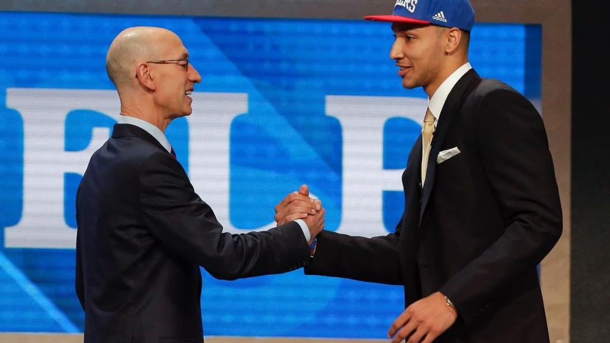 NBA Commissioner Adam Silver, left, greets Ben Simmons after announcing him as the top pick by the Philadelphia 76ers during the NBA basketball draft, Thursday, June 23, 2016, in New York.