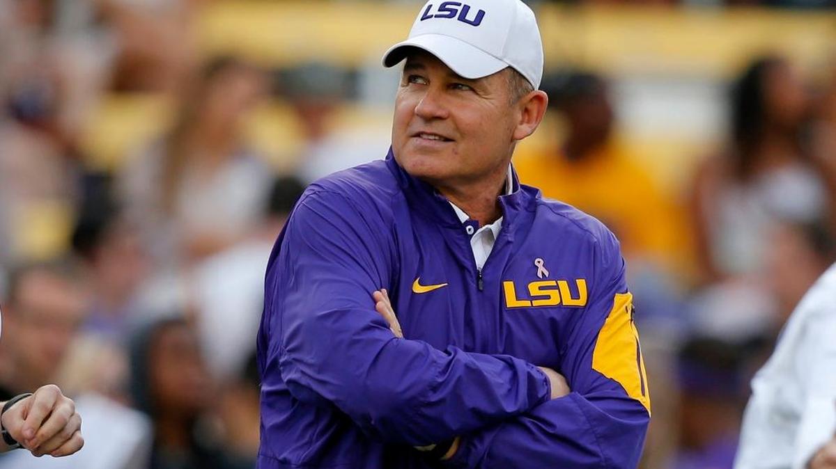 FILE - In this Oct. 17, 2015, file photo, LSU coach Les Miles watches his team warm up before a game against Florida in Baton Rouge, La. That Les Miles could be even considered to be on the dreaded hot seat at LSU entering this season tells you all you need to know about job security among college football coaches these days - especially those in the Southeastern Conference.