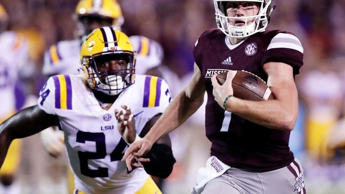 Mississippi State quarterback Nick Fitzgerald (7) sprints past LSU linebacker Tyler Taylor (24) during the Buldogs 37-7 victory over LSU in Starkville. But can the Bulldogs use the momentum to a victory on the road at Georgia?