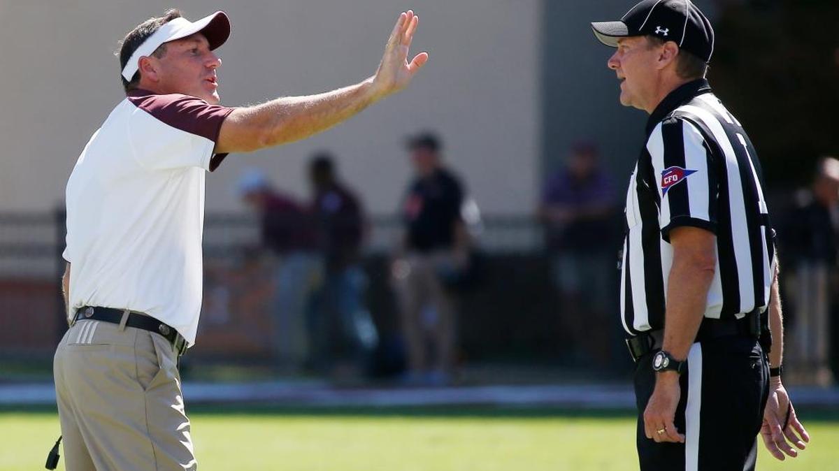 Mississippi State head coach Dan Mullen argues with an official during a game against Auburn Saturday in Starkville. Auburn won 38-14.