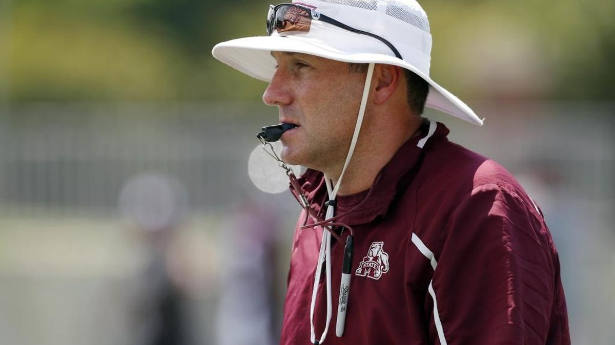 Mississippi State coach Dan Mullen whistles for his players to move to their next station during practice in Starkville, Tuesday, July 25, 2017.