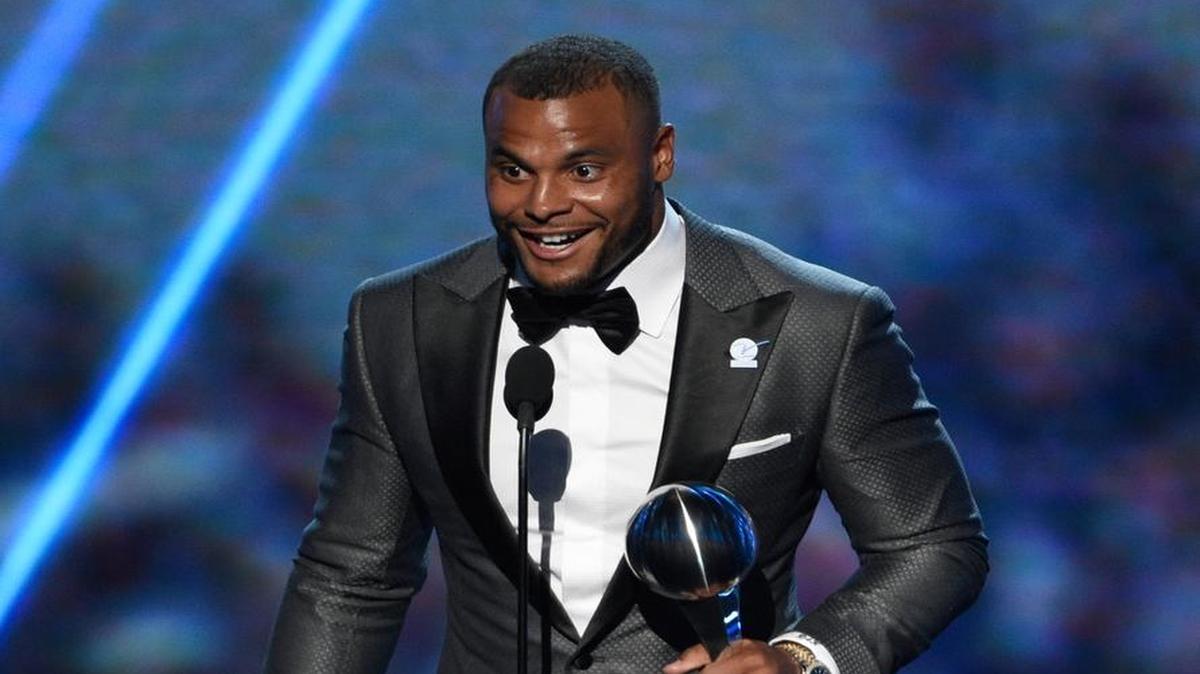 NFL football player Dak Prescott, of the Dallas Cowboys, accepts the award for best breakthrough athlete at the ESPYs at the Microsoft Theater on Wednesday, July 12, 2017, in Los Angeles.