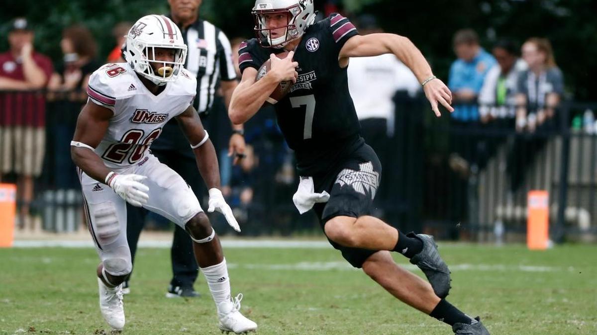 Mississippi State quarterback Nick Fitzgerald (7) runs for a first down past Massachusetts linebacker Jarell Addo (26). Mississippi State plays Arkansas Saturday.