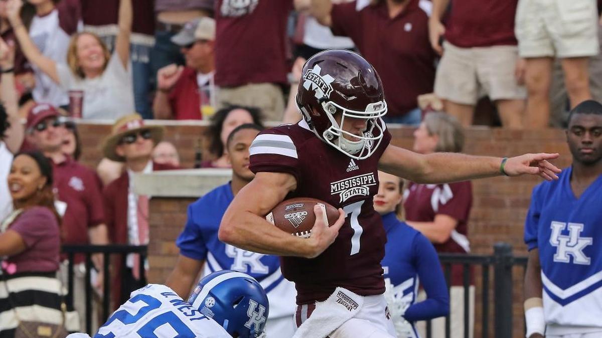 Mississippi State quarterback Nick Fitzgerald (7) eludes Kentucky safety Darius West (25). The Bulldogs travel to Texas A&M Saturday.