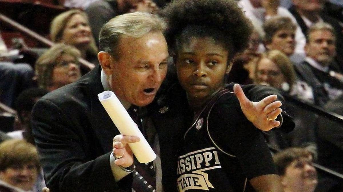 Mississippi State head coach Vic Schaefer goes over a previous play with Jazzmun Holmes in Starkville on Jan. 18, 2016.