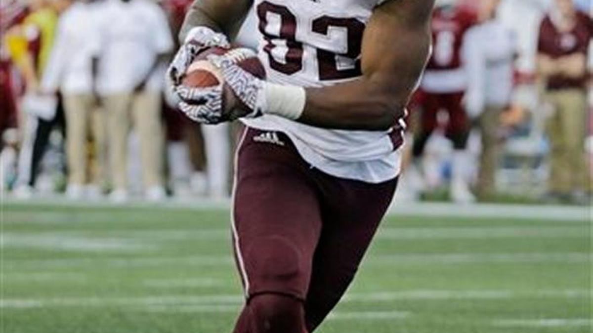 Mississippi State tight end Farrod Green (82) catches a pass for a touchdown against Massachusetts, Saturday in Foxborough, Mass.