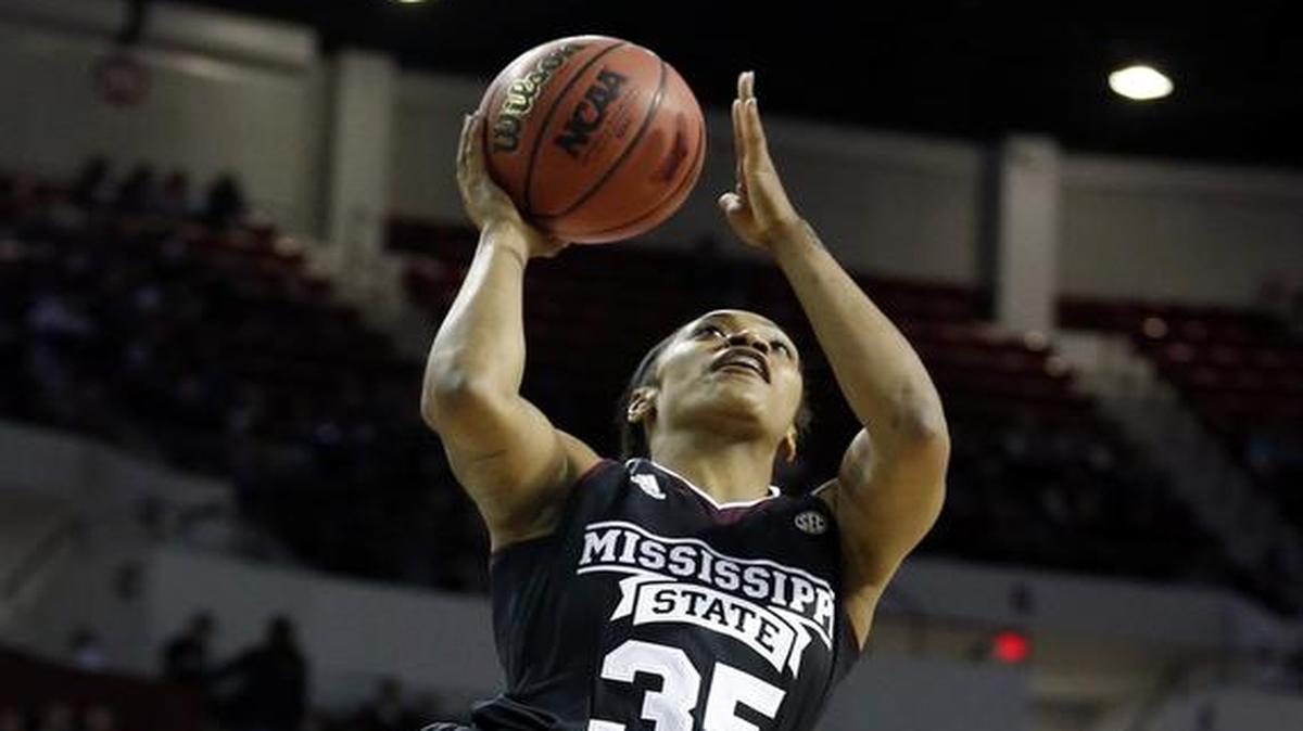 Mississippi State forward Victoria Vivians (35) shoots a basket over Texas guard Brianna Taylor (20) .
