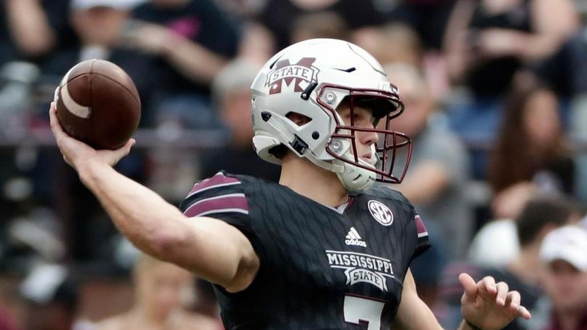 Mississippi State quarterback Nick Fitzgerald (7) throws against Massachusetts .