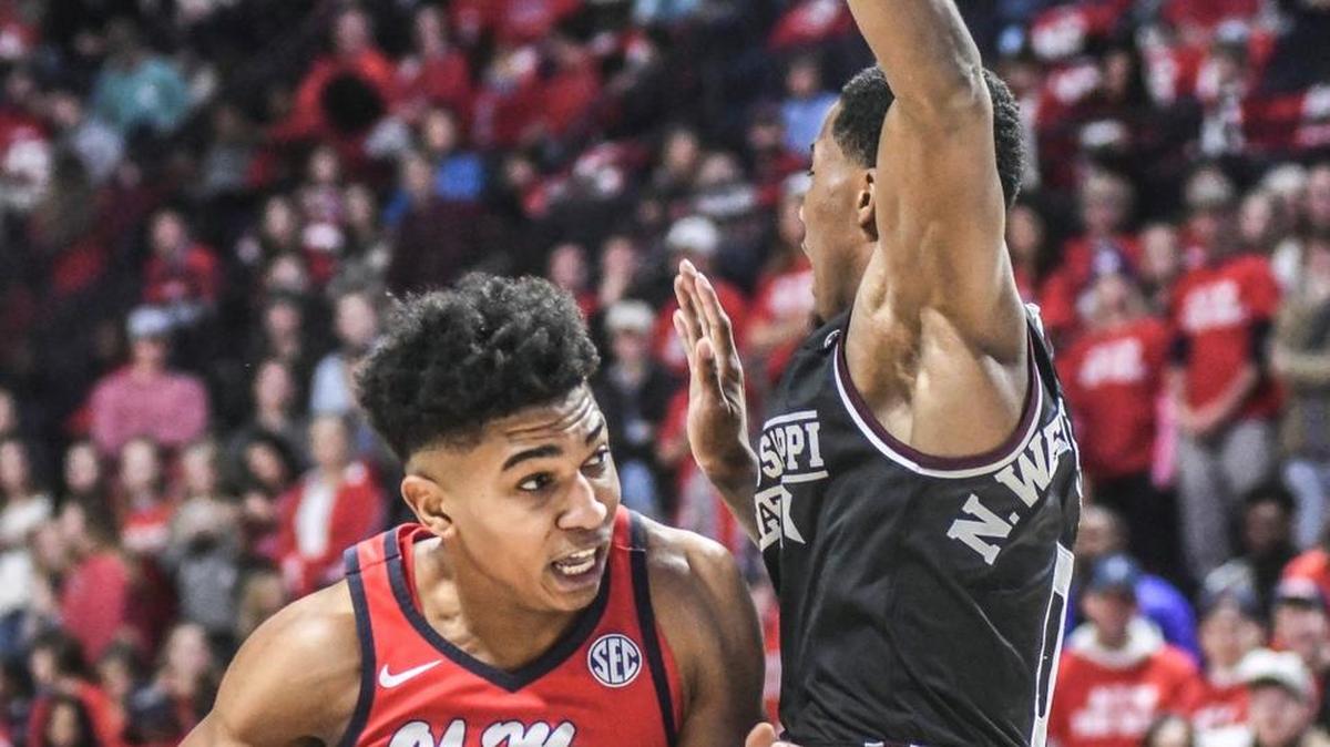 Ole Miss’ Breein Tyree (4) is called for a charging foul against Mississippi State's Nick Weatherspoon (0).