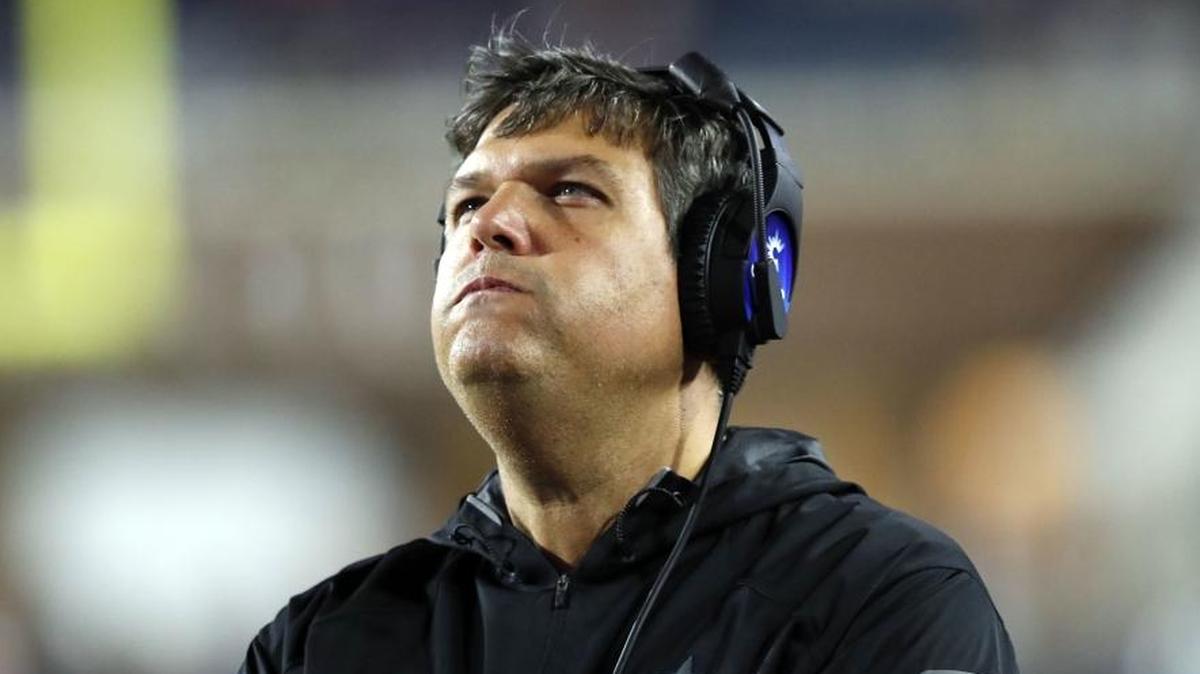 Mississippi head coach Matt Luke looks at the replay of a play on the video board in the final minutes of their game against Texas A&M in Oxford on Saturday.