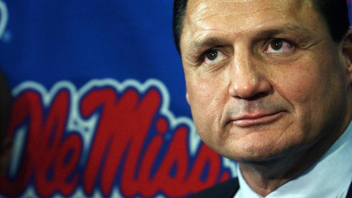 Ed Orgeron listens to a reporter's question, in Oxford, Miss., Thursday, Dec. 16, 2004, moments after he was introduced as the new Ole Miss head coach.