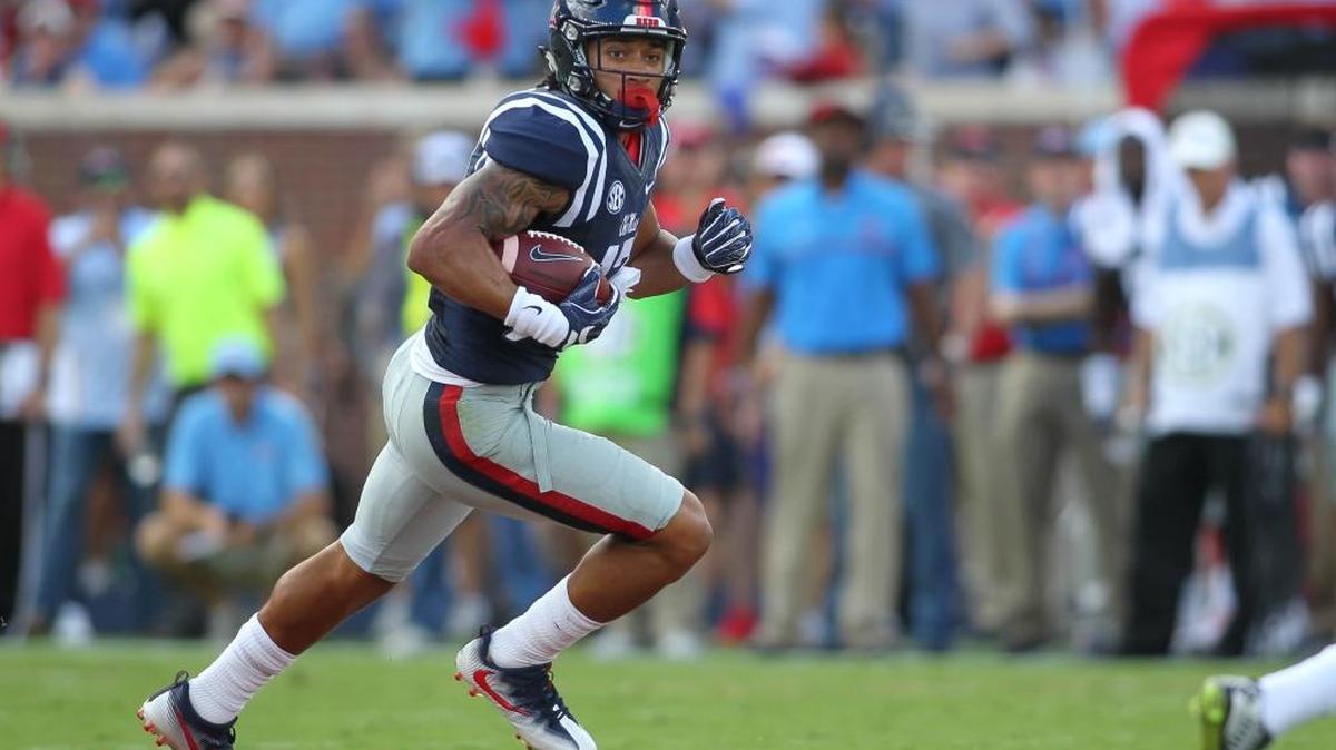 Ole Miss tight end Evan Engram races downfield after his catch against Alabama at Vaught-Hemingway Stadium last week.
