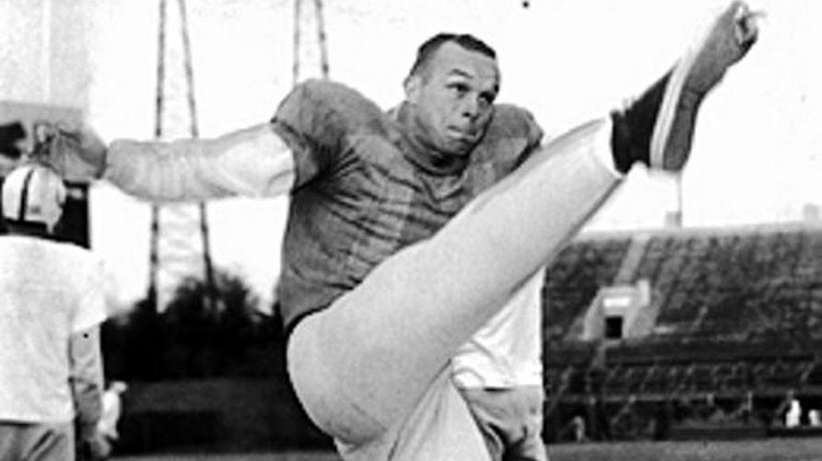 Raymond Brown works out while punting for the Baltimore Colts.