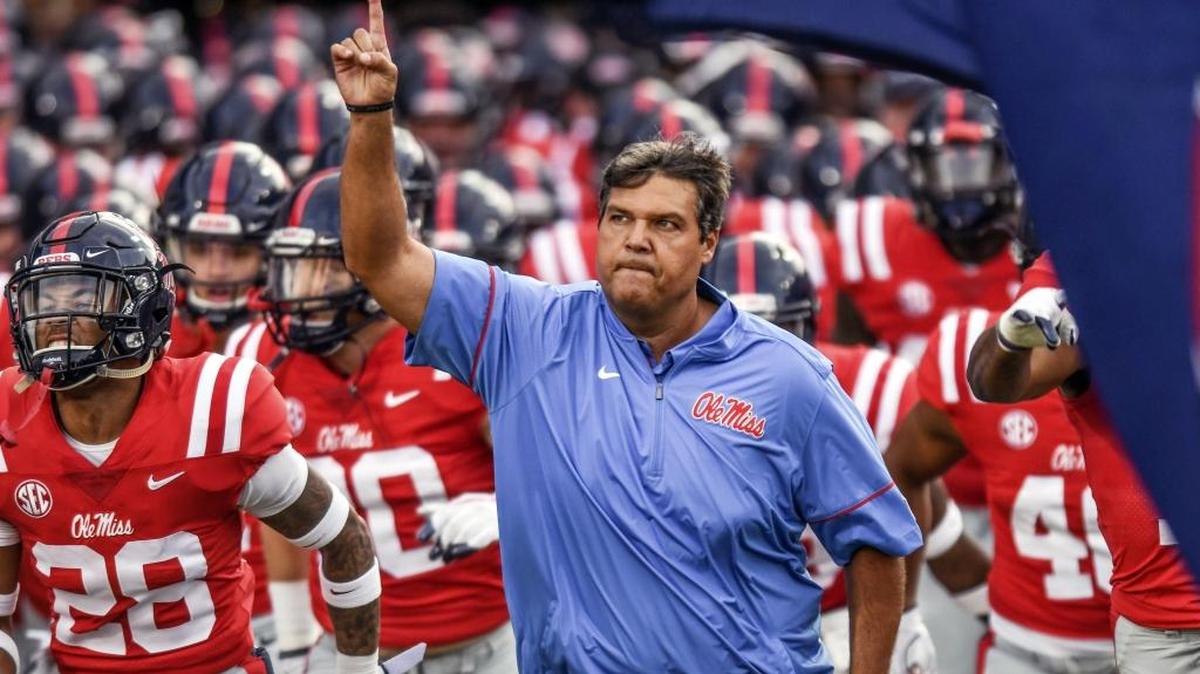 Ole Miss interim head coach Matt Luke leads the team onto the field for the game against South Alabama at Vaught-Hemingway Stadium in Oxford. The Rebels host Louisiana-Lafayette on Saturday.
