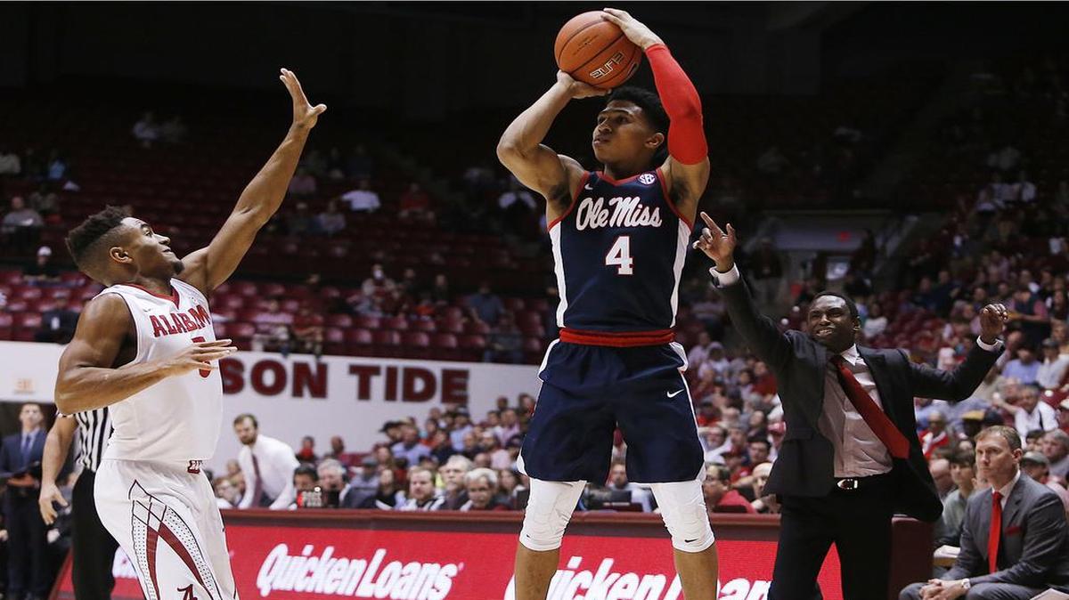 Ole Miss’ Breein Tyree (4) shoots as Alabama's Avery Johnson Jr. (5) defends.