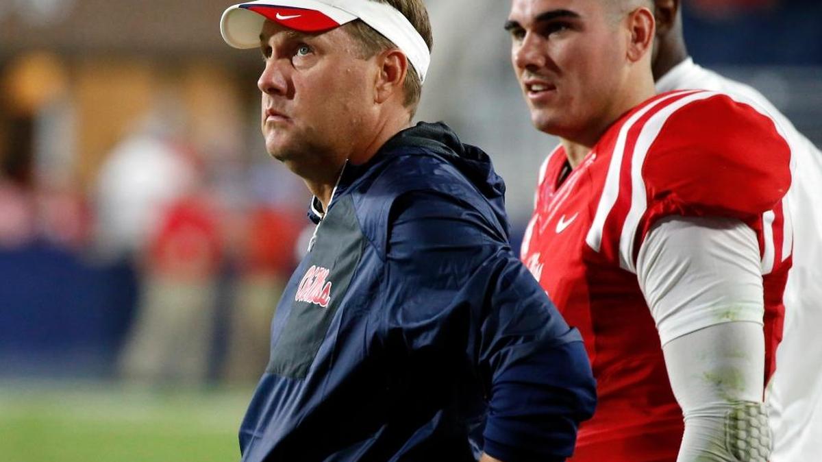 Ole Miss head coach Hugh Freeze and starting quarterback Chad Kelly (10) watch the final seconds wind down at the end of their game against Memphis on Oct. 1 in Oxford.