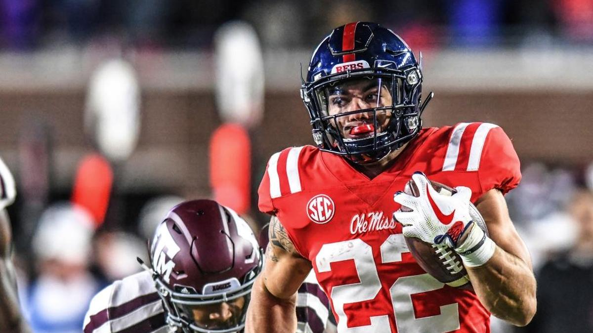 Ole Miss running back Jordan Wilkins (22) out runs Texas A&M defensive back Armani Watts (23) for a touchdown.