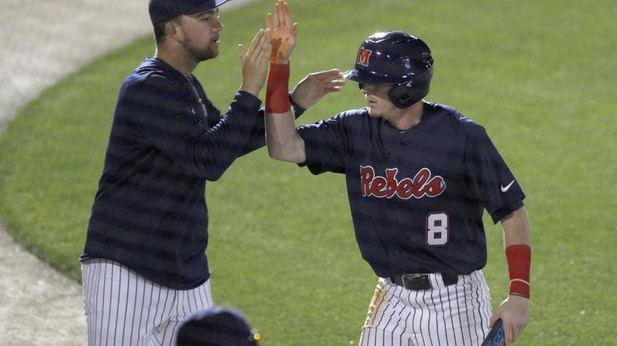 Will Golsan of Ole Miss gets a high five after scoring against Nicholls at MGM Park on March 14, 2017.