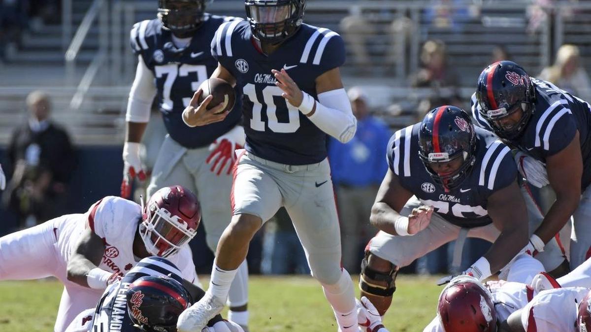 Ole Miss quarterback Jordan Ta'amu (10) is a threat to pass and run. The Rebels travel to Kentucky on Saturday.