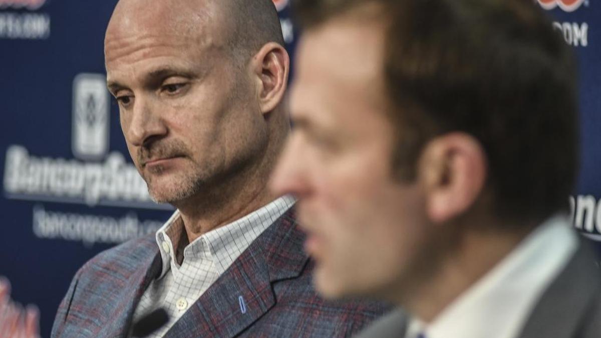Mississippi head coach Andy Kennedy, left, listens as athletic director Ross Bjork speaks at a press conference at the Pavilion at Ole Miss in Oxford, Miss. on Monday, February 12, 2018. Kennedy, in his 12th season as Mississippi head coach, announced Sunday he was stepping down immediately after staying he would leave after the season ended.